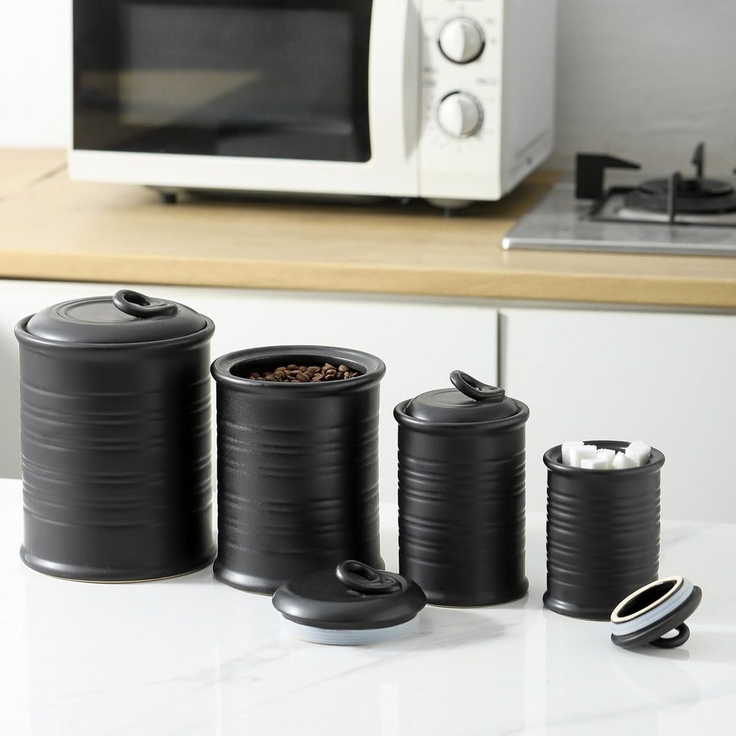 Nihow Food Storage Jar Sets: Ceramic Container with Air Tight Lid for Flour/Sugar/Rice/Coffee/Cookies/Candy - Seal Damp-proof Canister for The Kitchen Counter - Set of 4 （Matte Black）